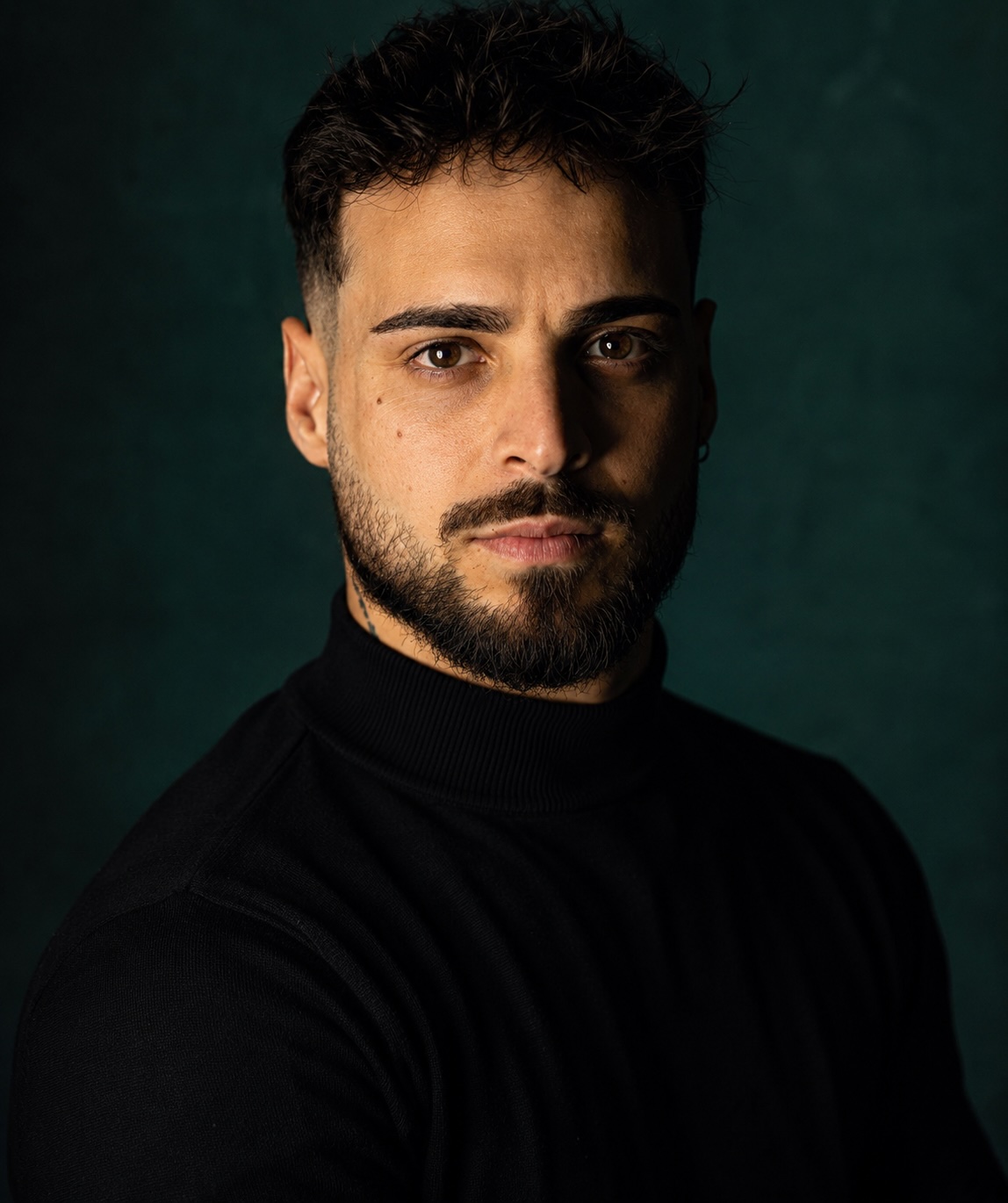 Alessio Ferraro wearing a black turtleneck
